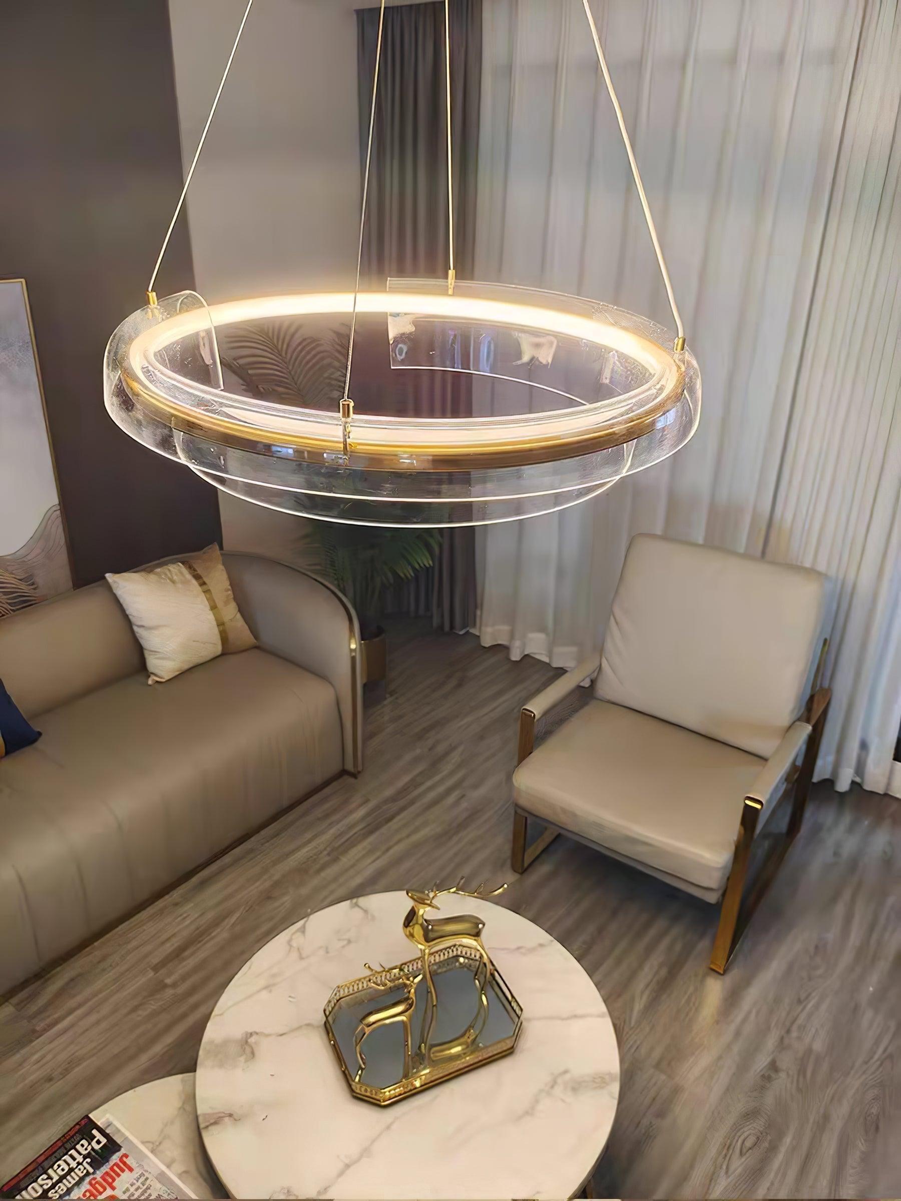 High view of a ring chandelier above a marble table