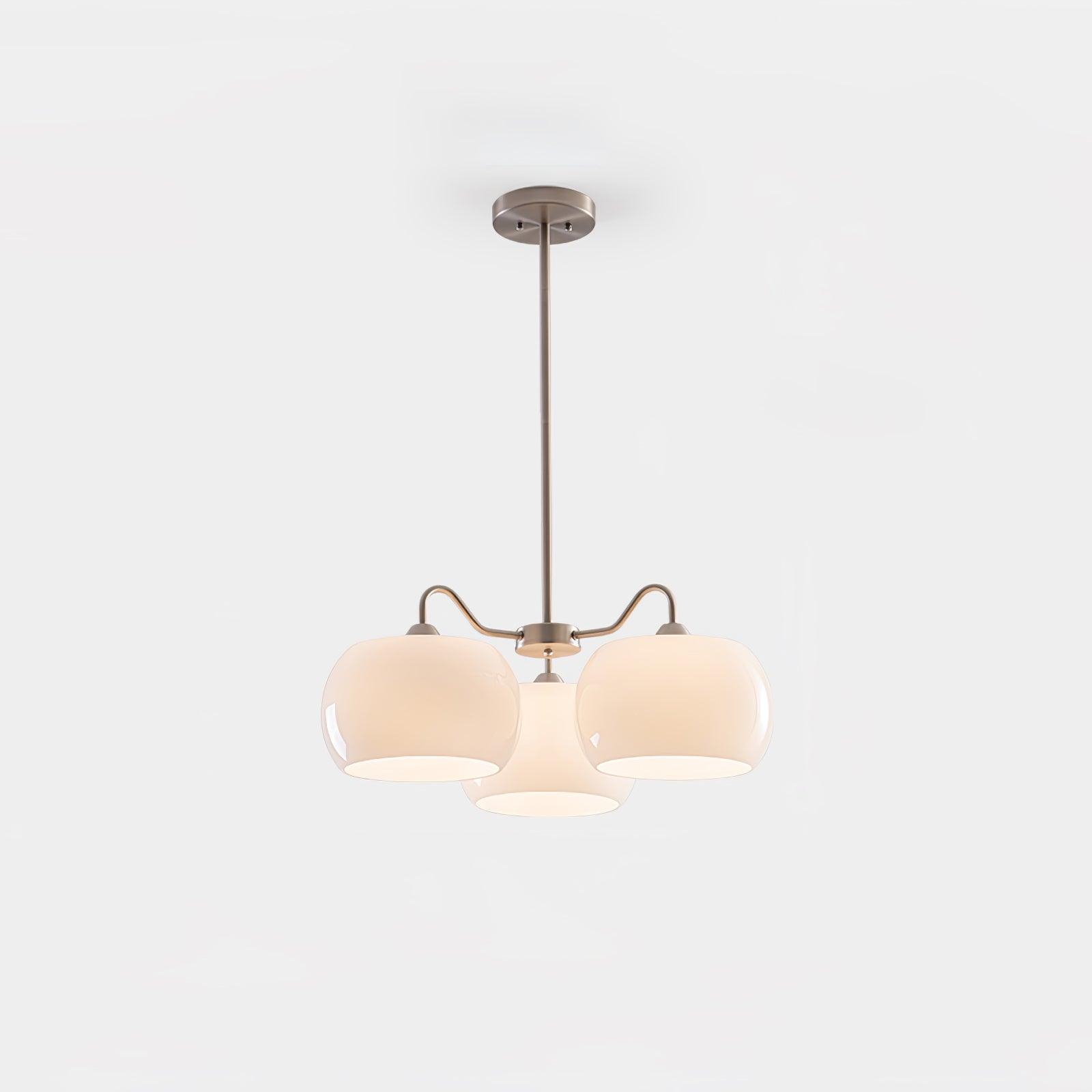 Persimmon chandelier with white glass shades and curved nickel-tone arms