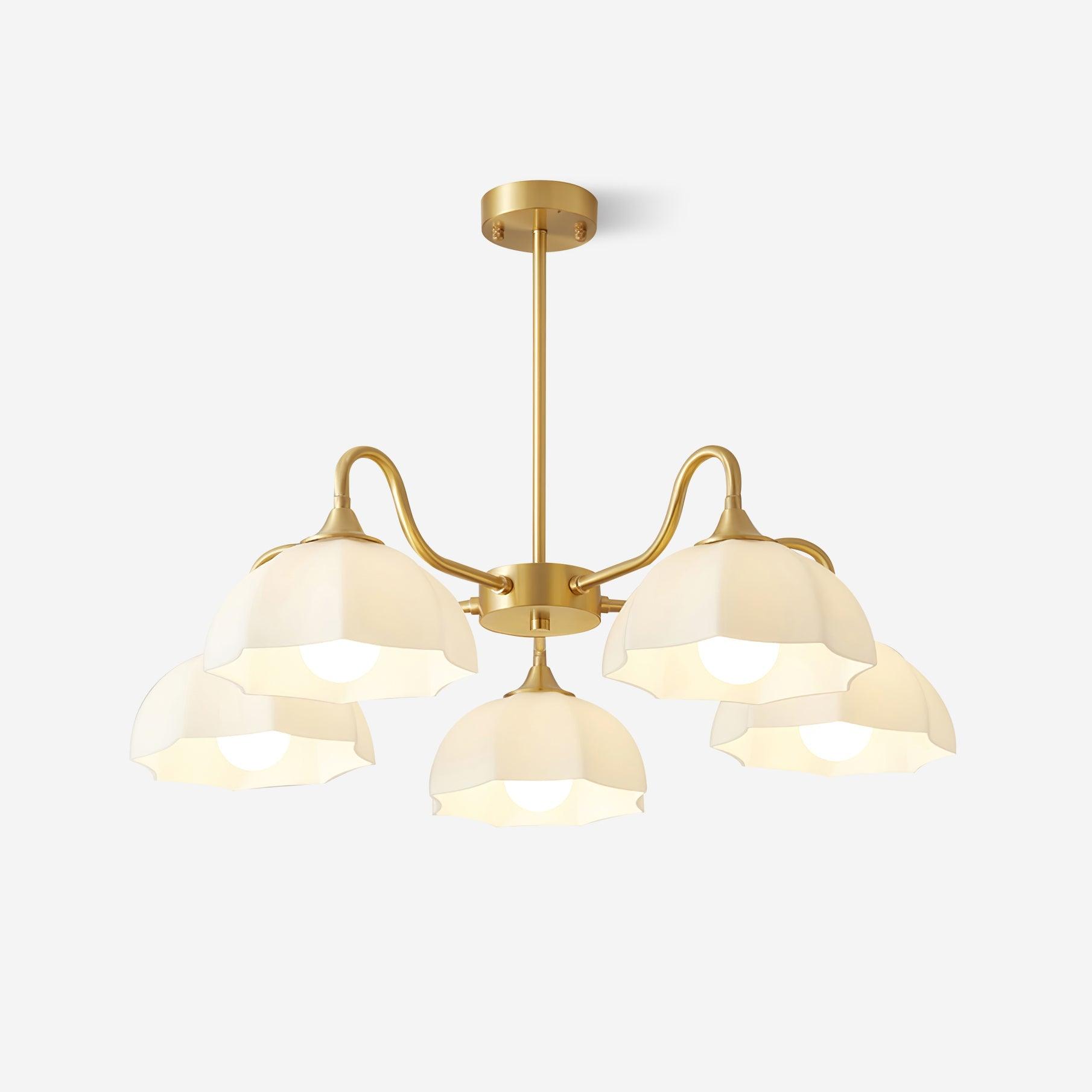 Five-head brass chandelier with white down-facing glass bowls