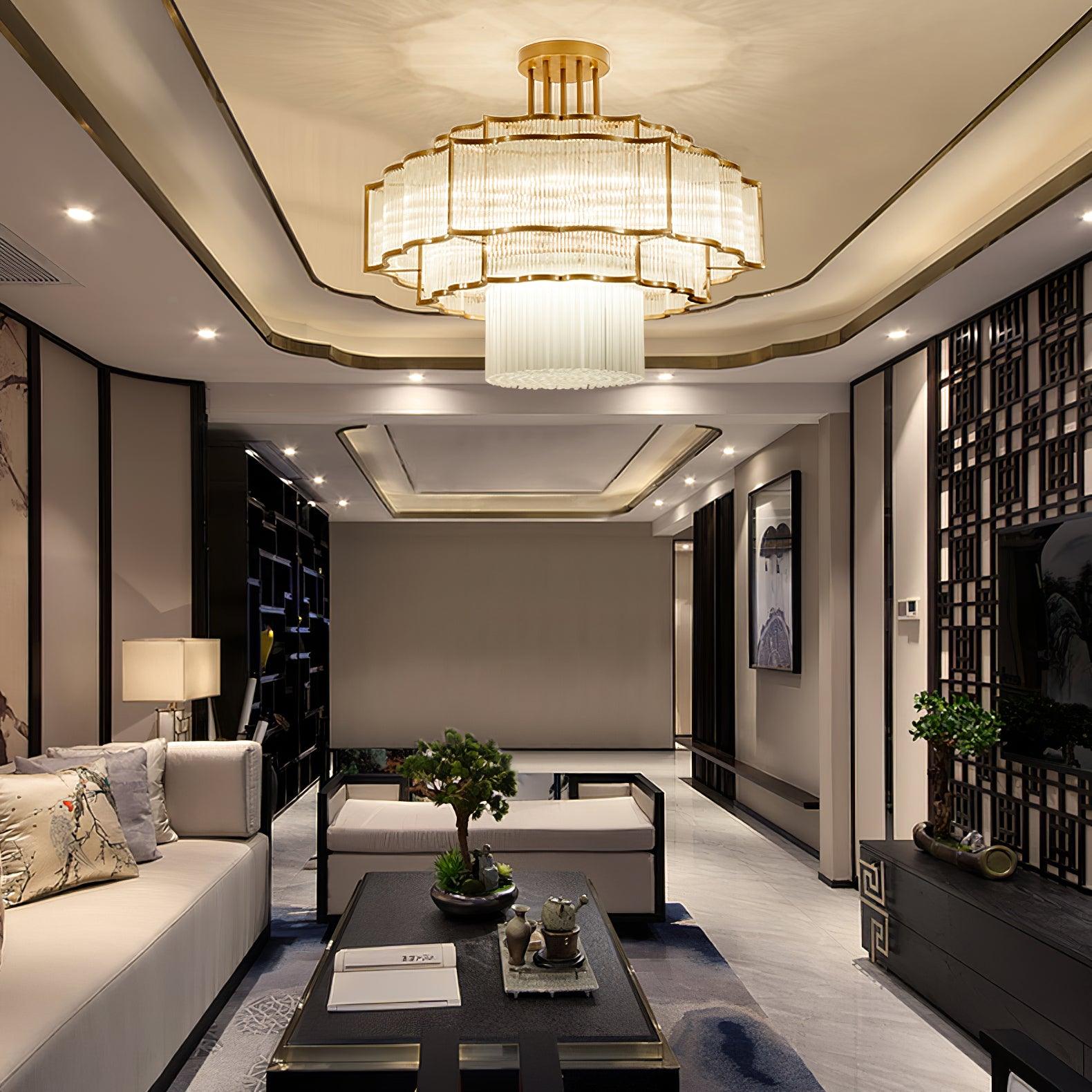 Pharo II tiered chandelier with clear ridged elements and a scalloped metal frame