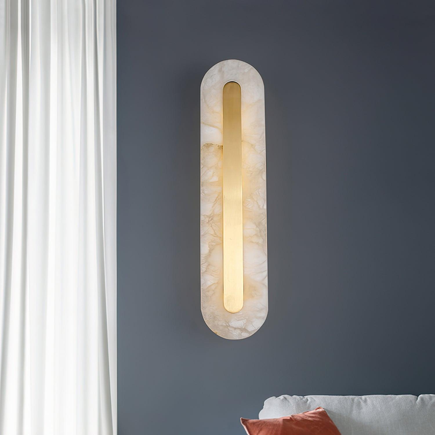Rounded stone panel beside a curtain