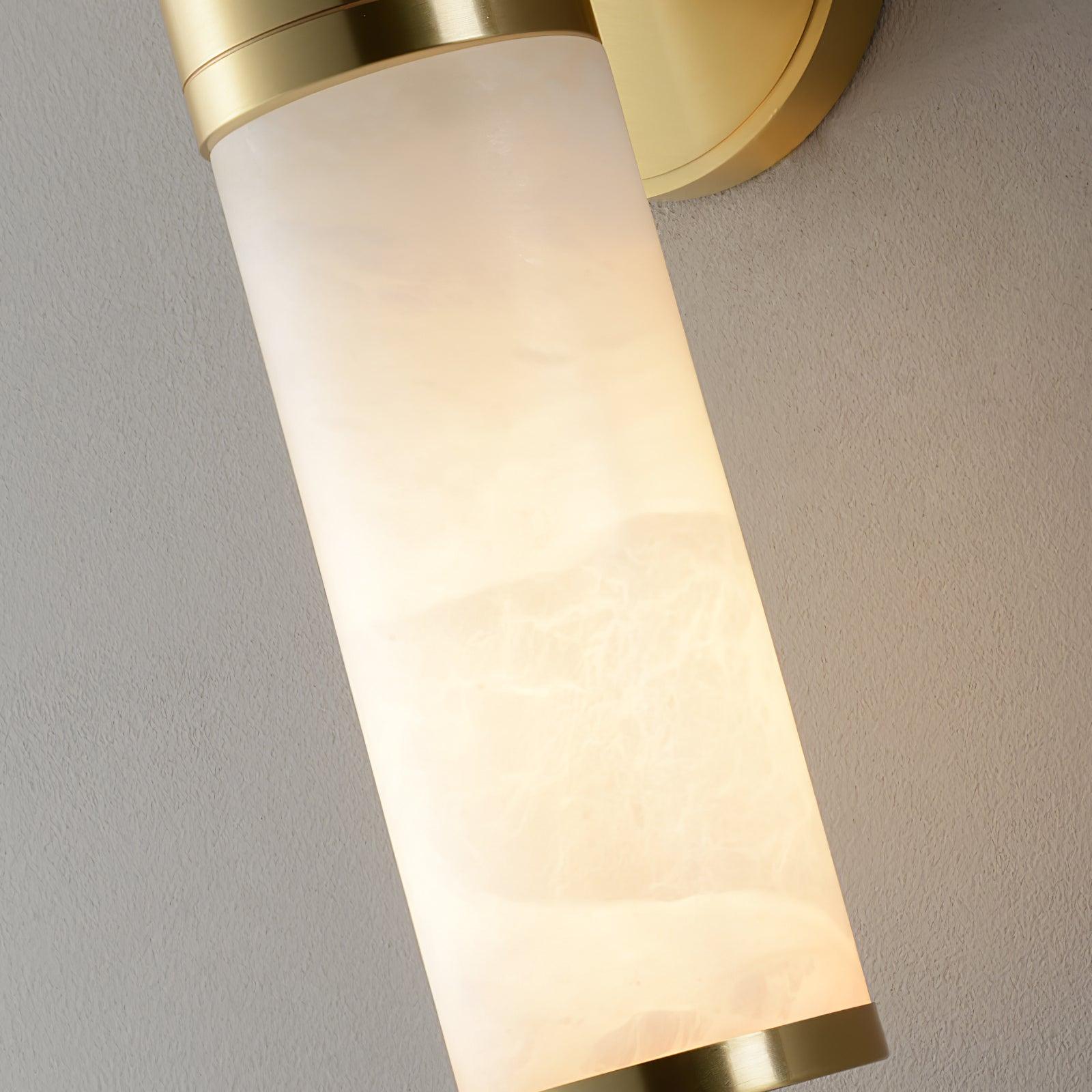 Close-up of cloudy alabaster patterns and gold-coloured end rim