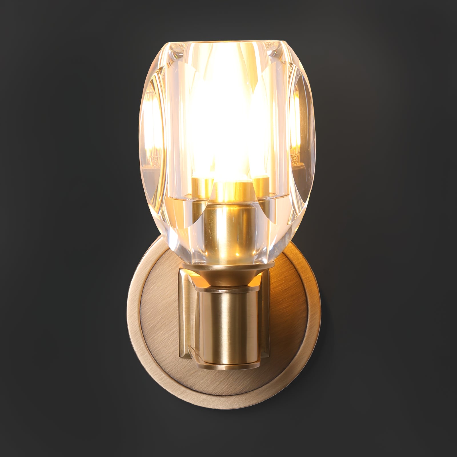 Lit Diamond Crystal fixture against a dark wall