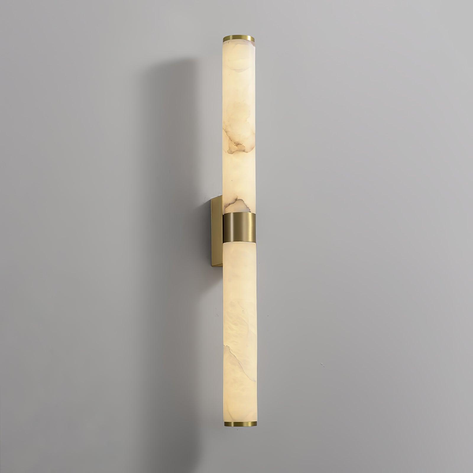 Front view of a glowing Line Alabaster fixture