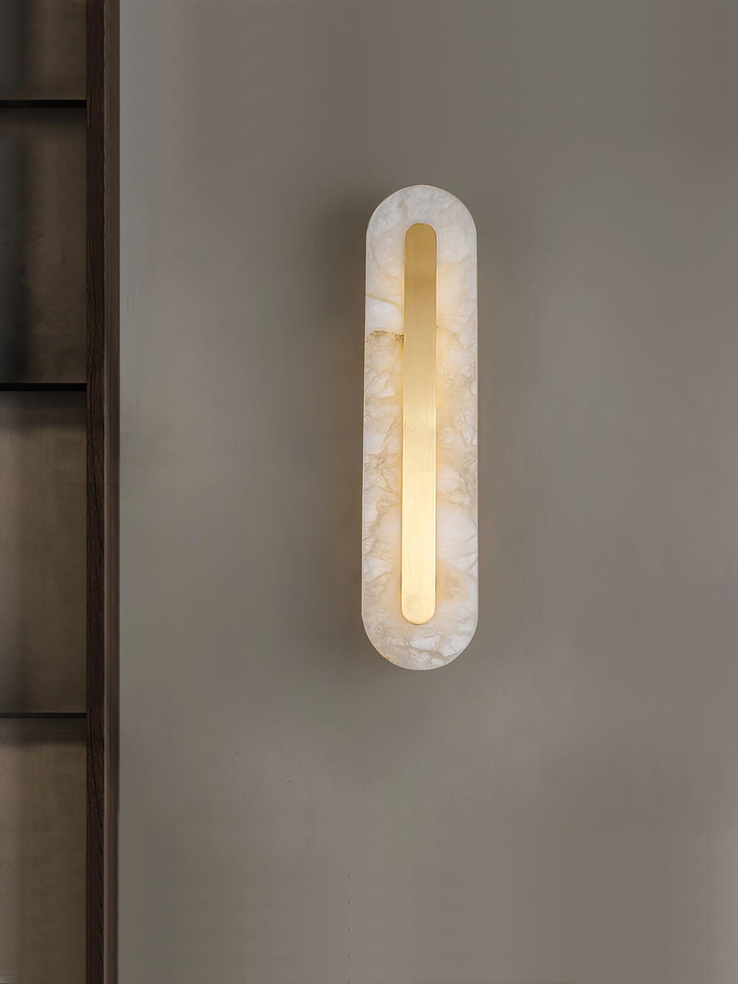 Stone wall light on a pale interior wall