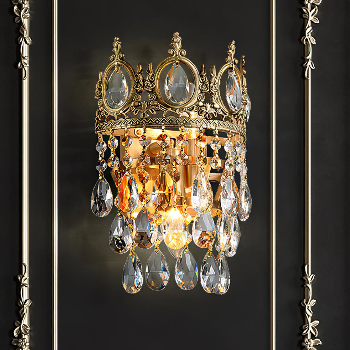Crown wall lamp against black decorative panelling