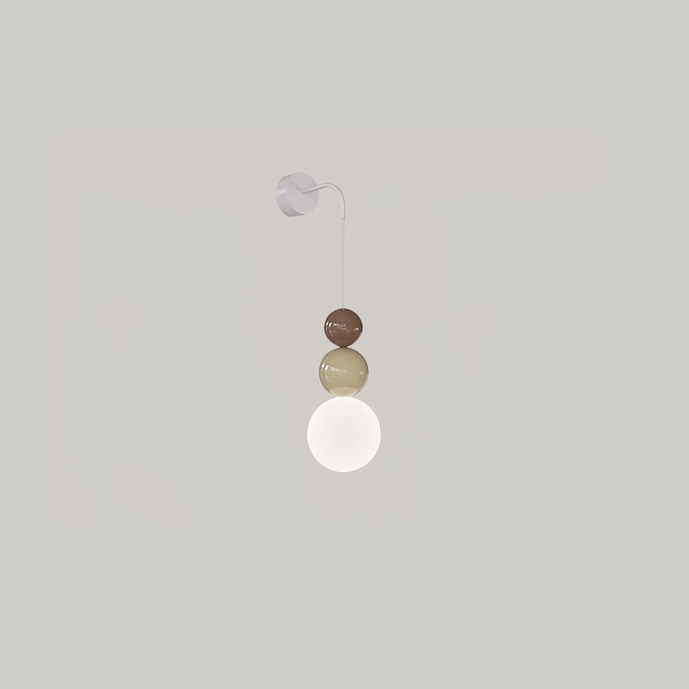 Brown-and-beige Three Ball wall light with a white lower globe and circular wall plate