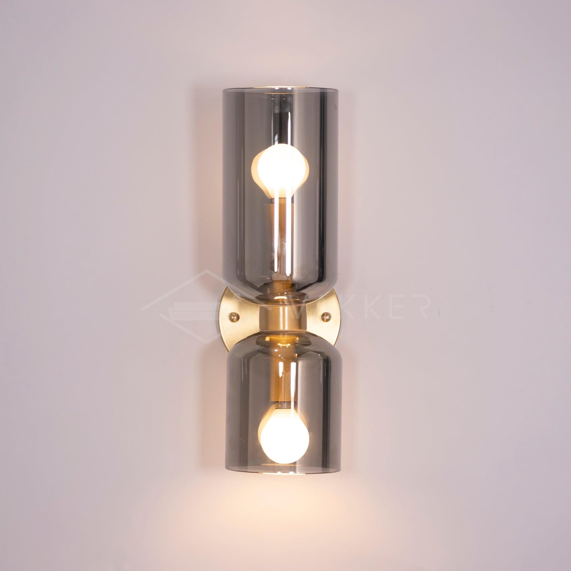 Edie glass wall lamp with unequal upper and lower cylinders