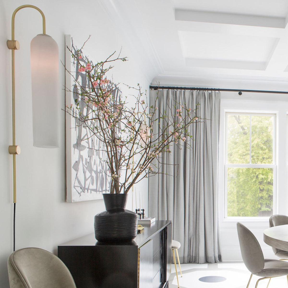 White tube fixture in a bright living area