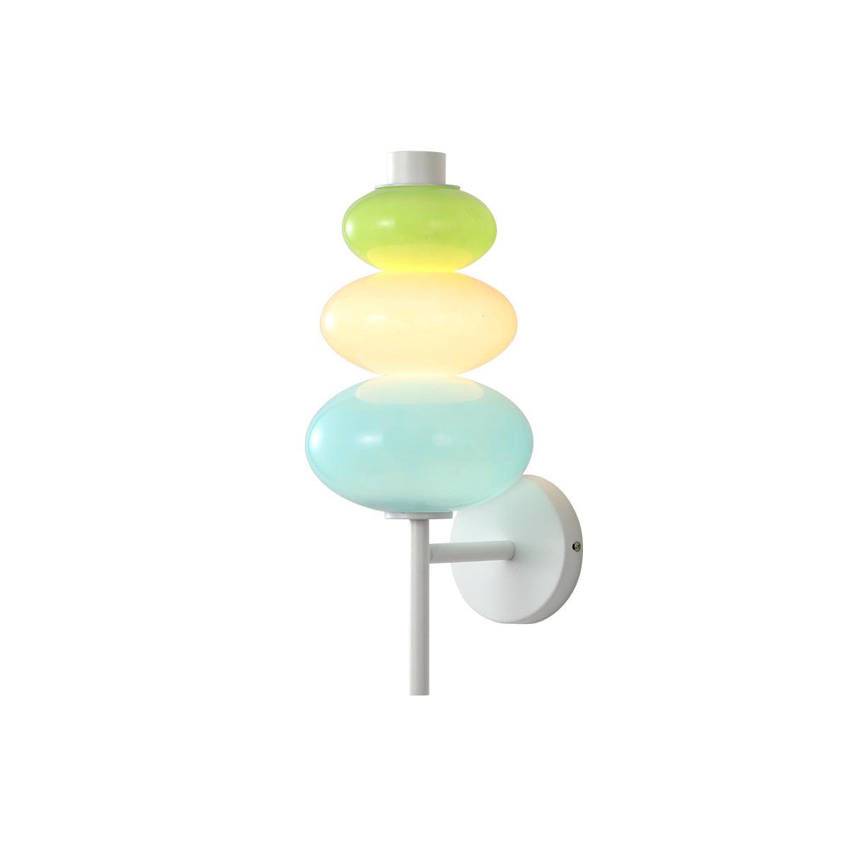 Isolated lit Candy String wall light with a glowing middle segment, white arm and round plate