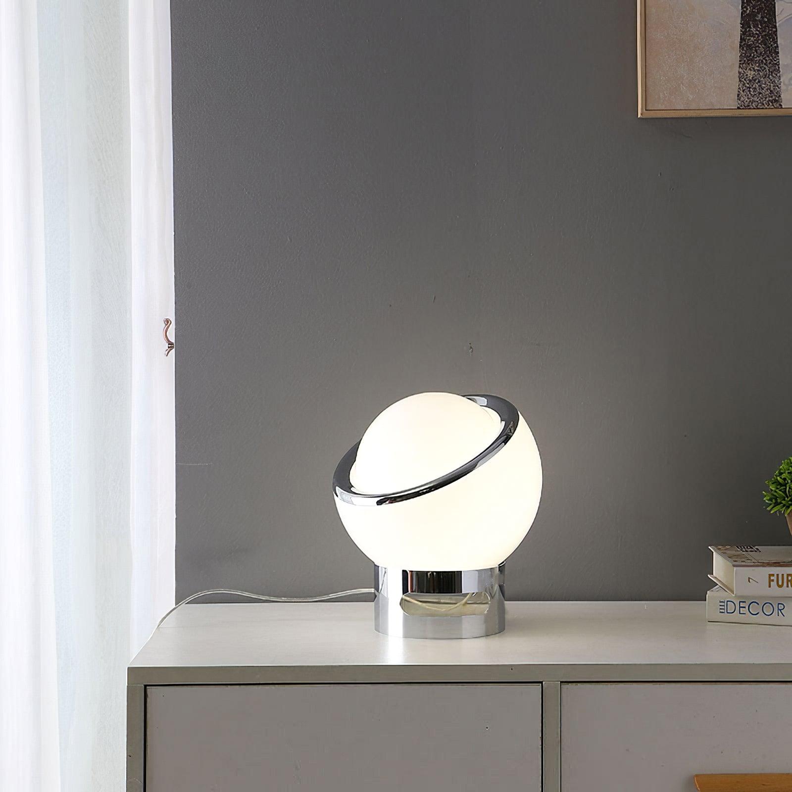 White Valeria lamp on a cabinet beside a window