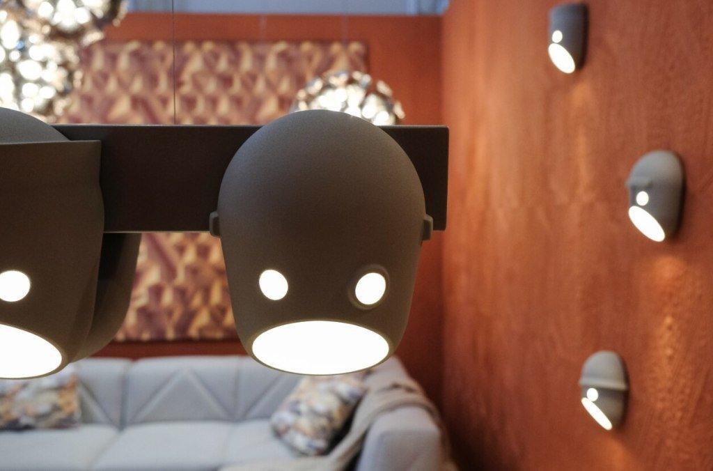 Close view of an illuminated face wall light