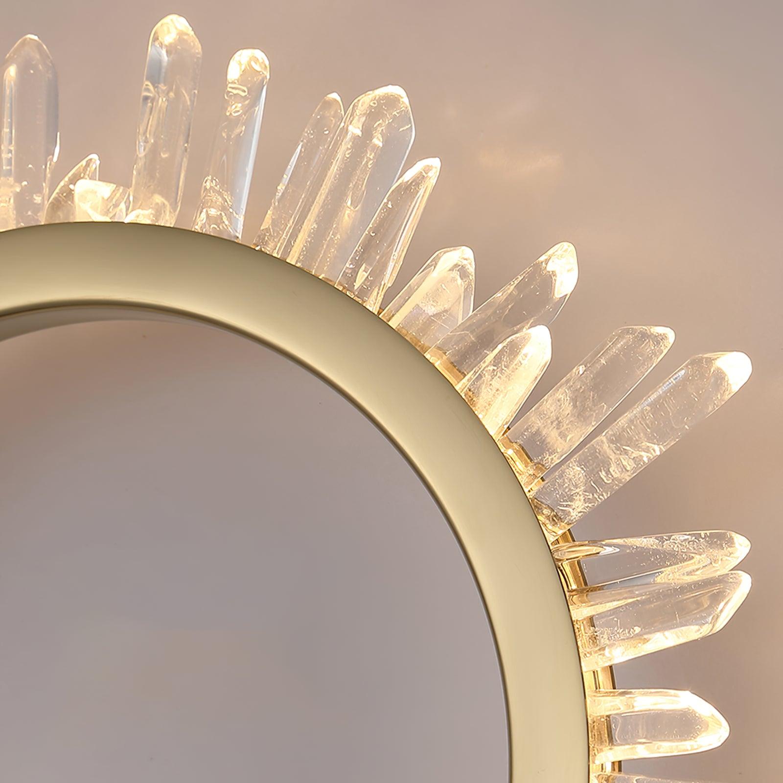 Close-up of varied clear crystal points radiating from the upper-right gold arc