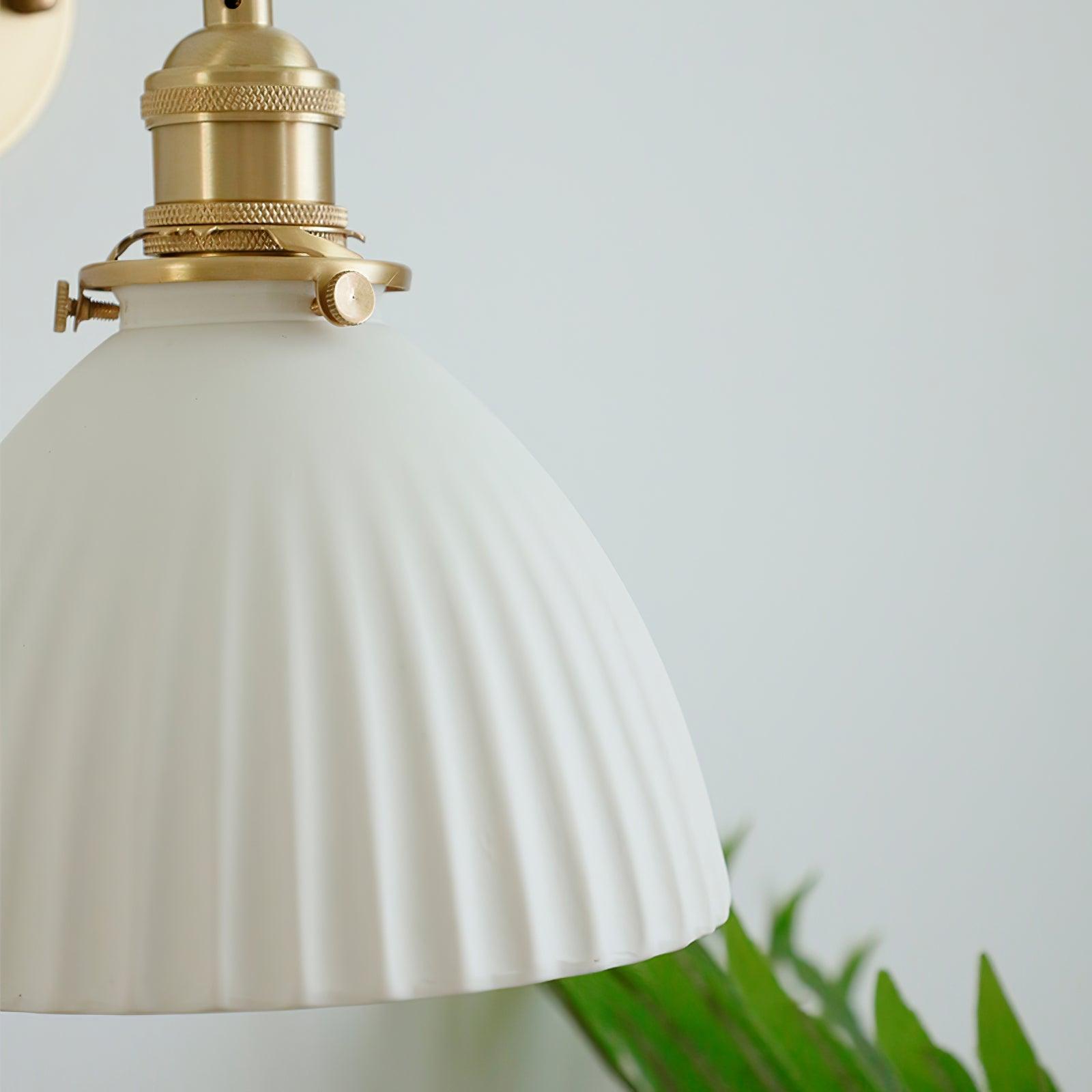 Close-up of the white ceramic shade neck, metal retaining ring, thumb screws and knurled brass-tone holder