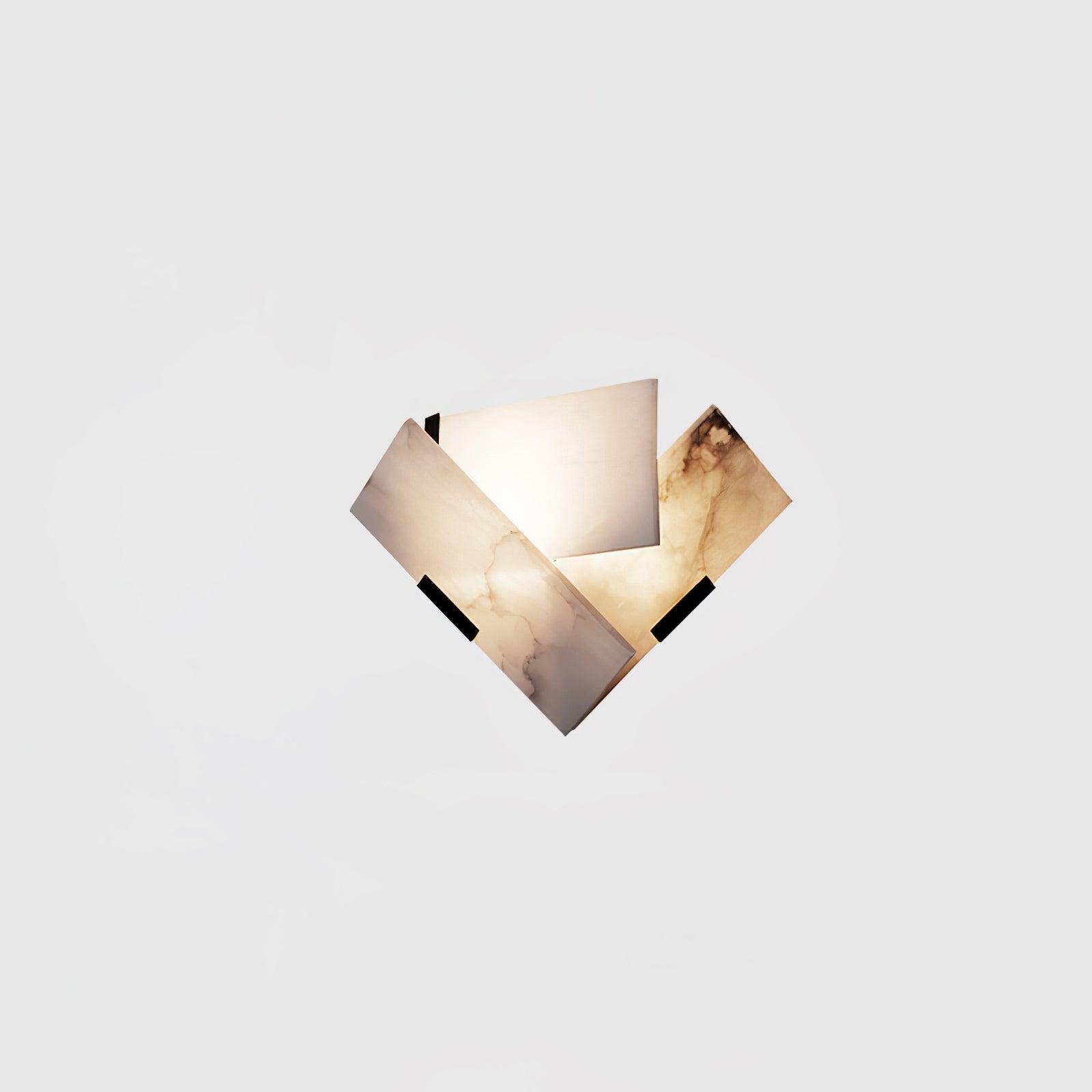 Single lit angular alabaster sconce on white, showing diagonal panels, natural veins and black clips