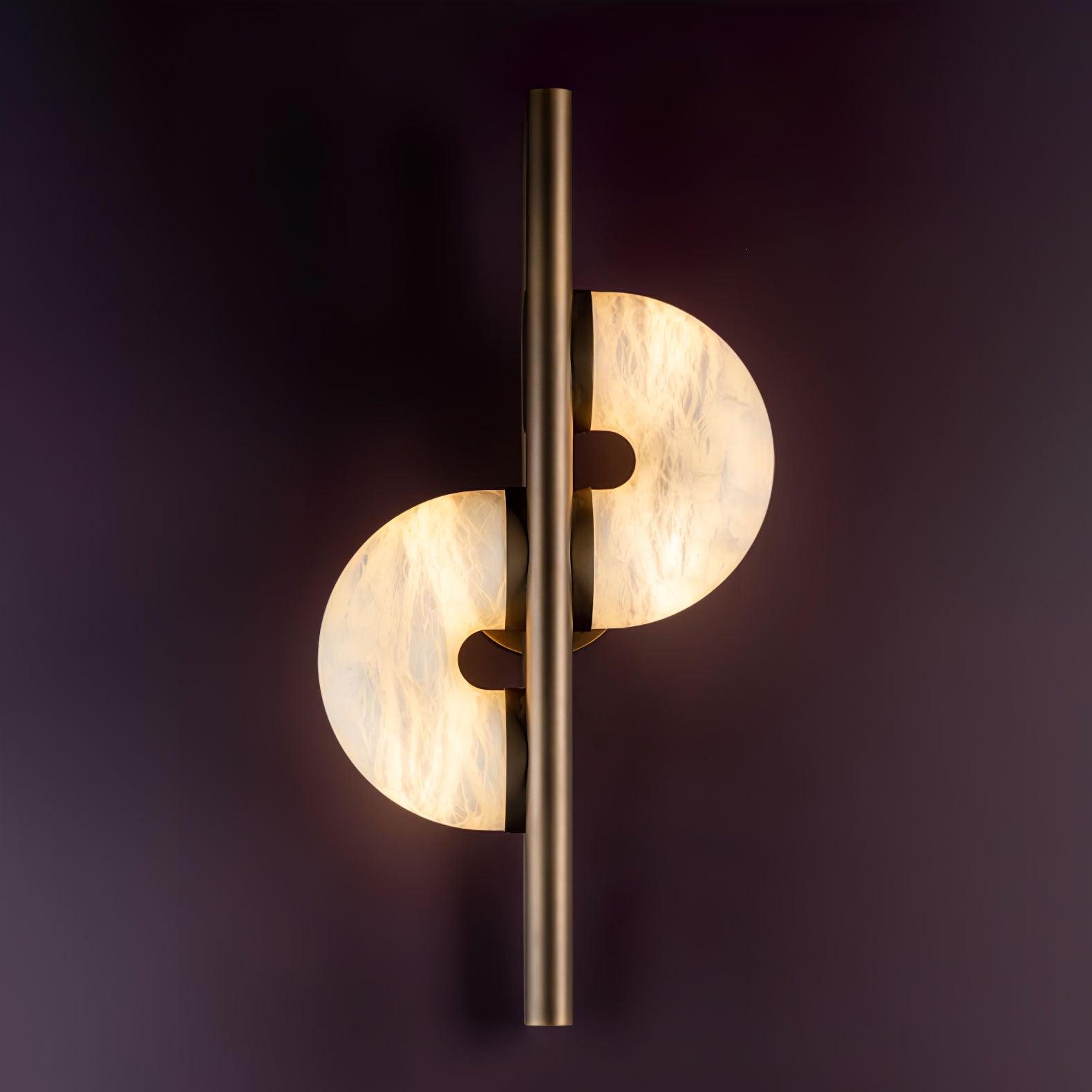 Nearly front lit Dolly on purple wall with two glowing veined discs and bronze bar extending above and below