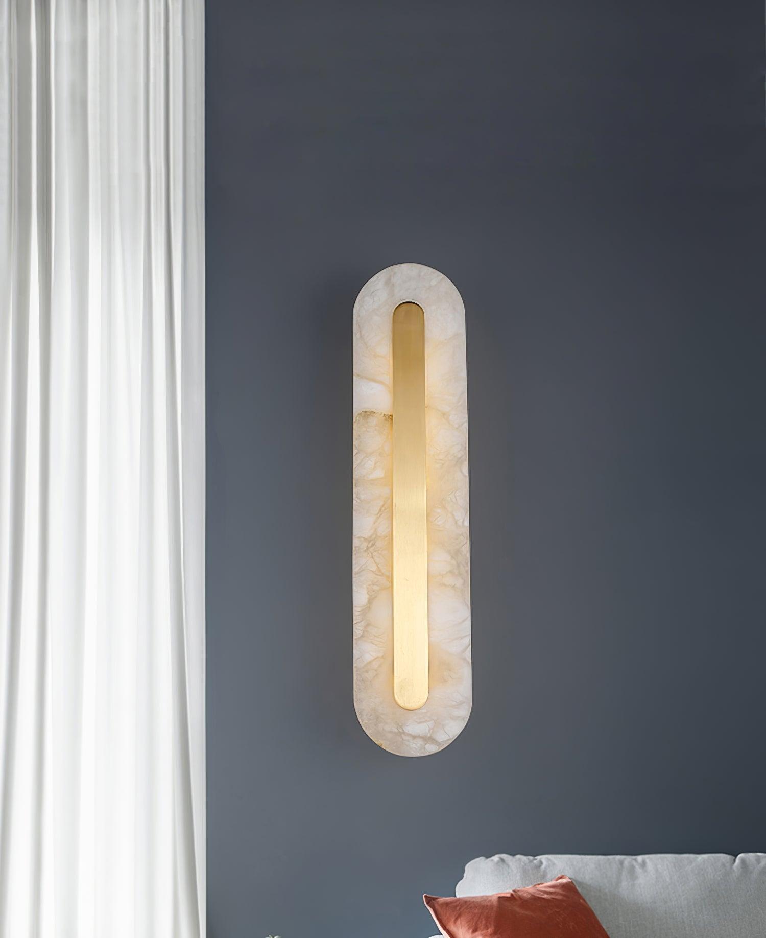 Rounded alabaster fixture near a curtain