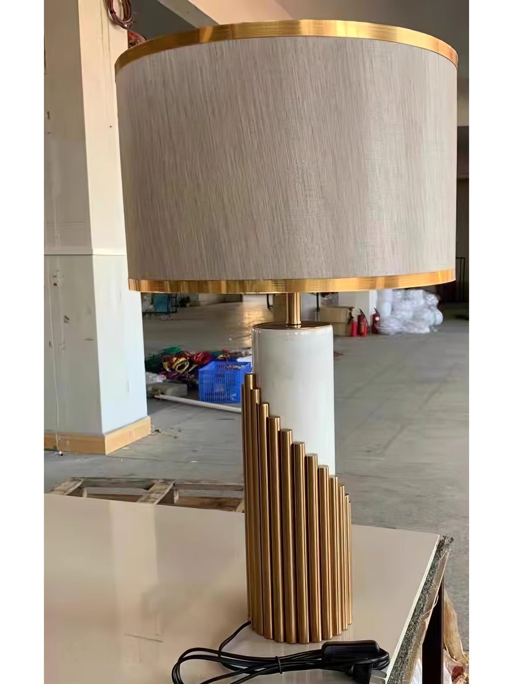 Close view of Streamline fabric shade, Gold tubes and coiled cable