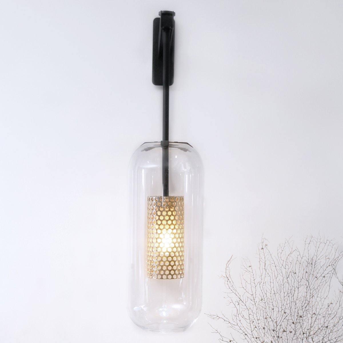 Front view of Black arm and suspended glass