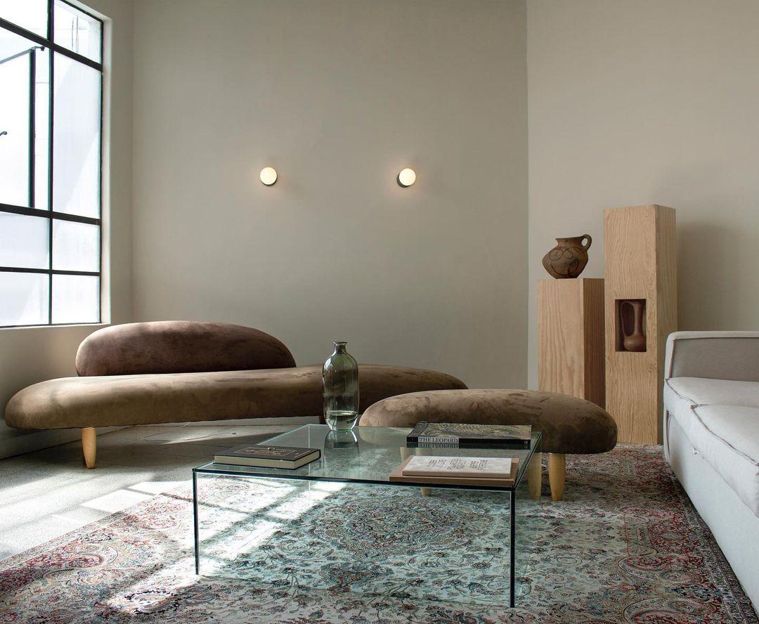 Small globe wall lights in a living room