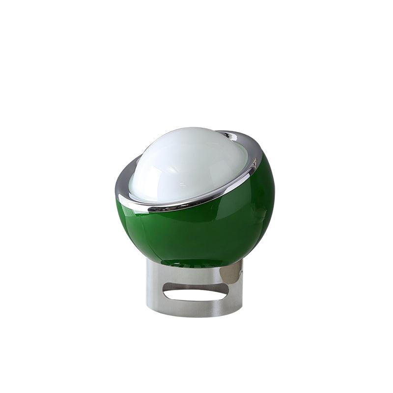 Valeria lamp with a green rounded shade, pale dome and reflective base