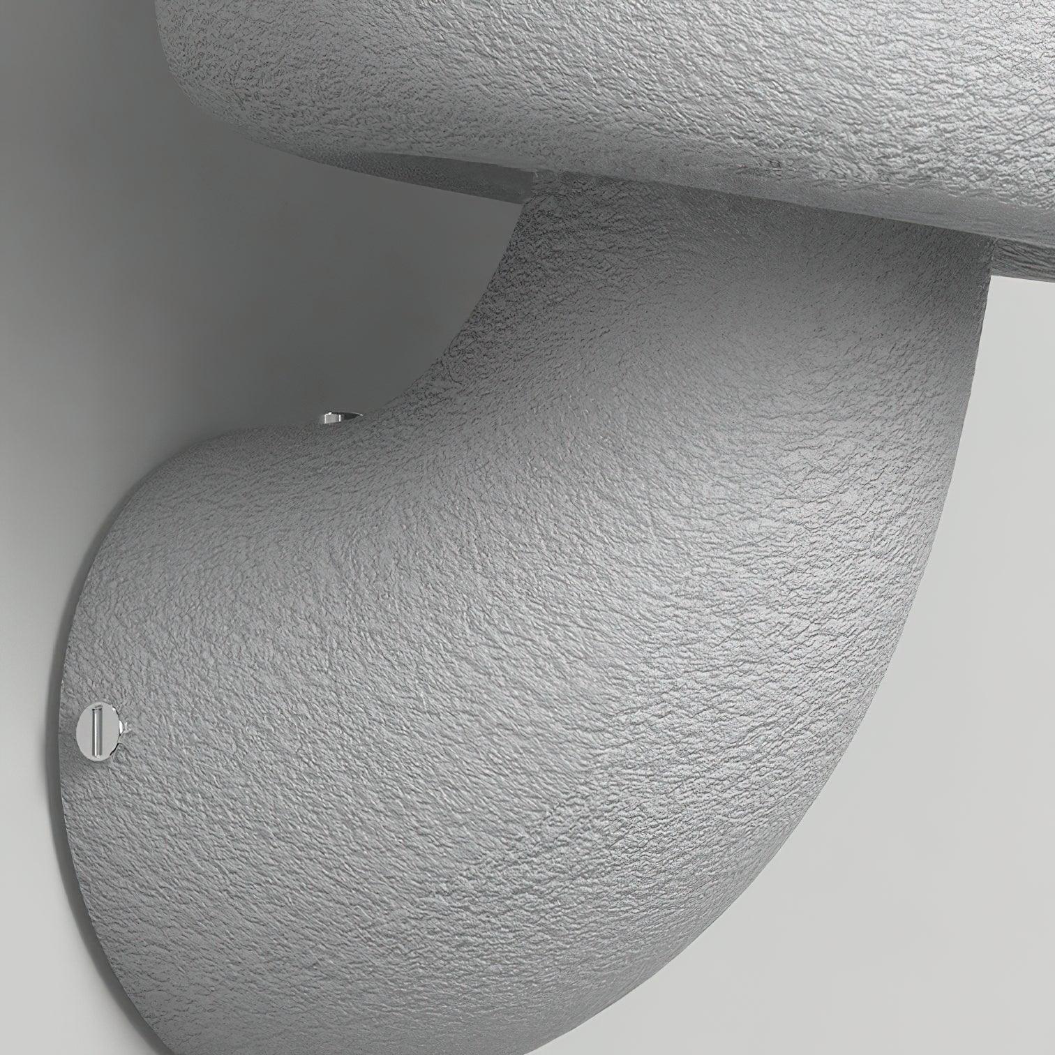 Close view of textured curved base and visible fasteners