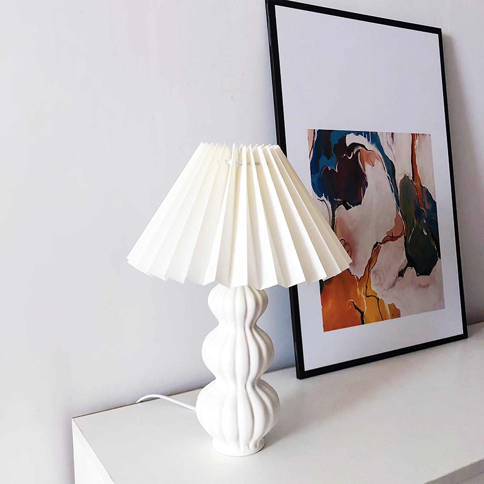 Angled view of Leo white pleated shade and ribbed body