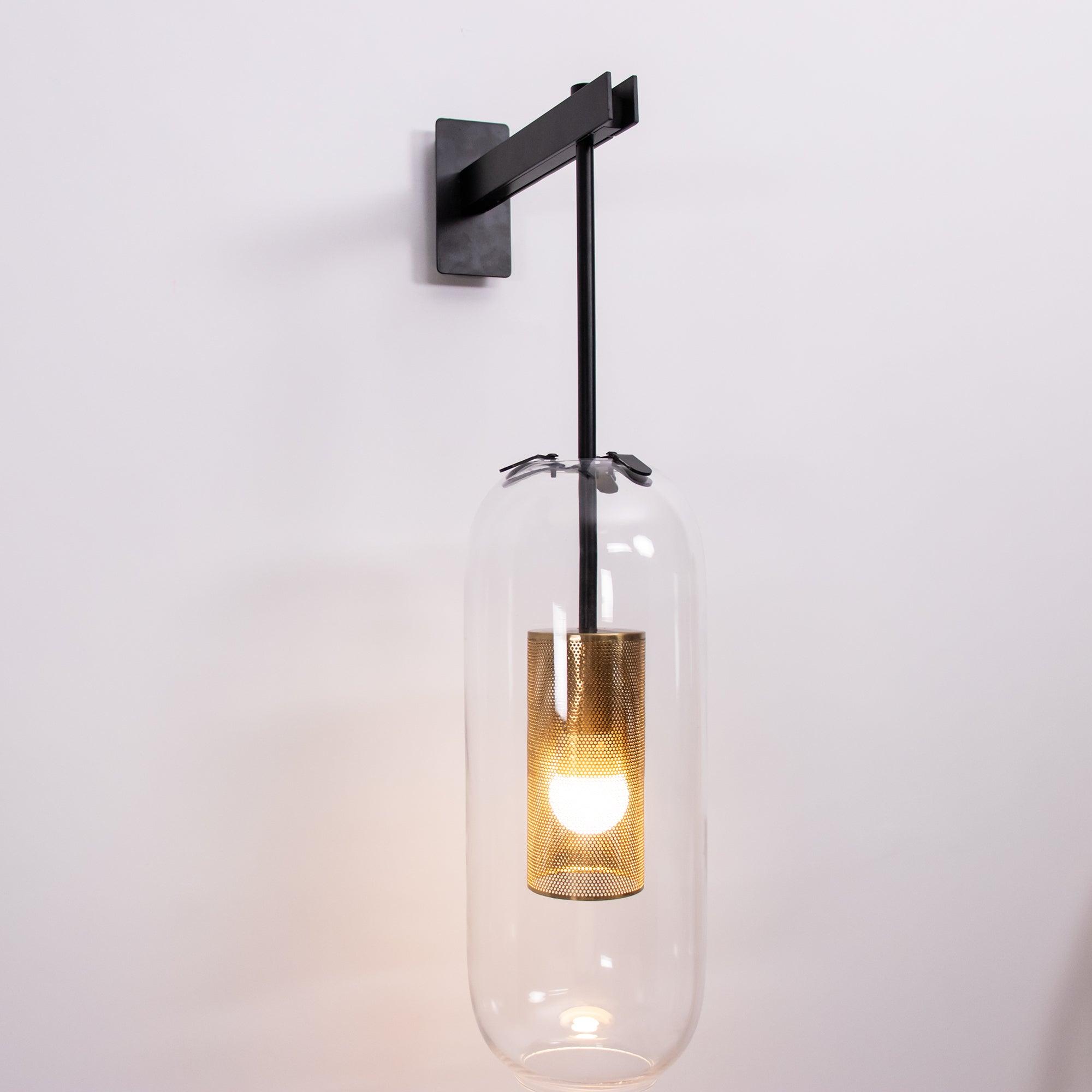 Illuminated Black fixture on a pale wall
