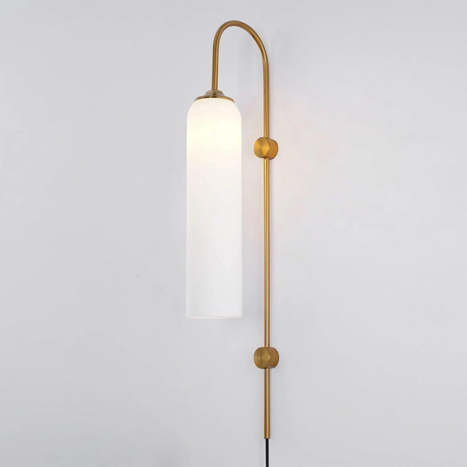Milky white cylindrical glass shade on a gold-coloured wall stem