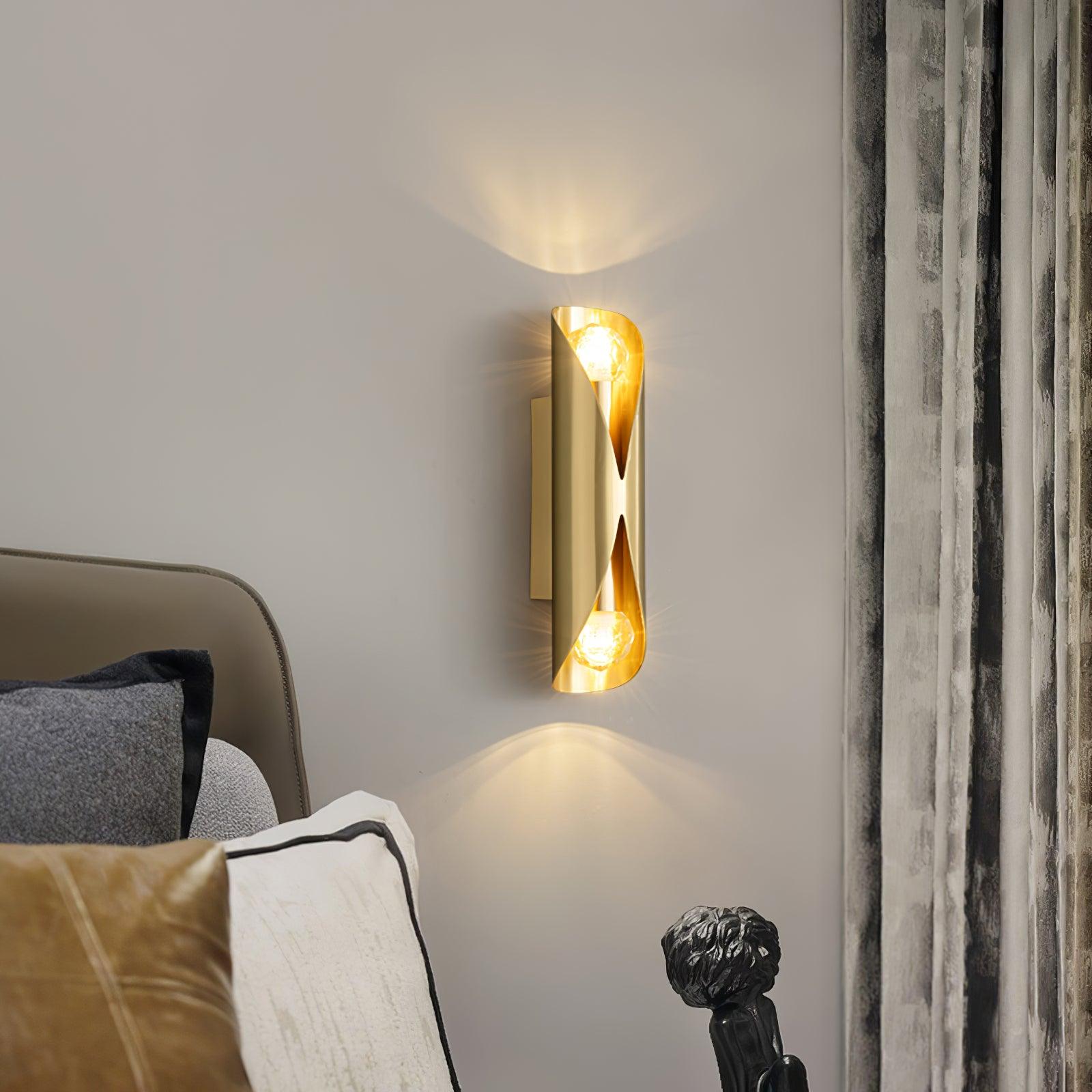 Slim Brass wall lamp beside a sofa