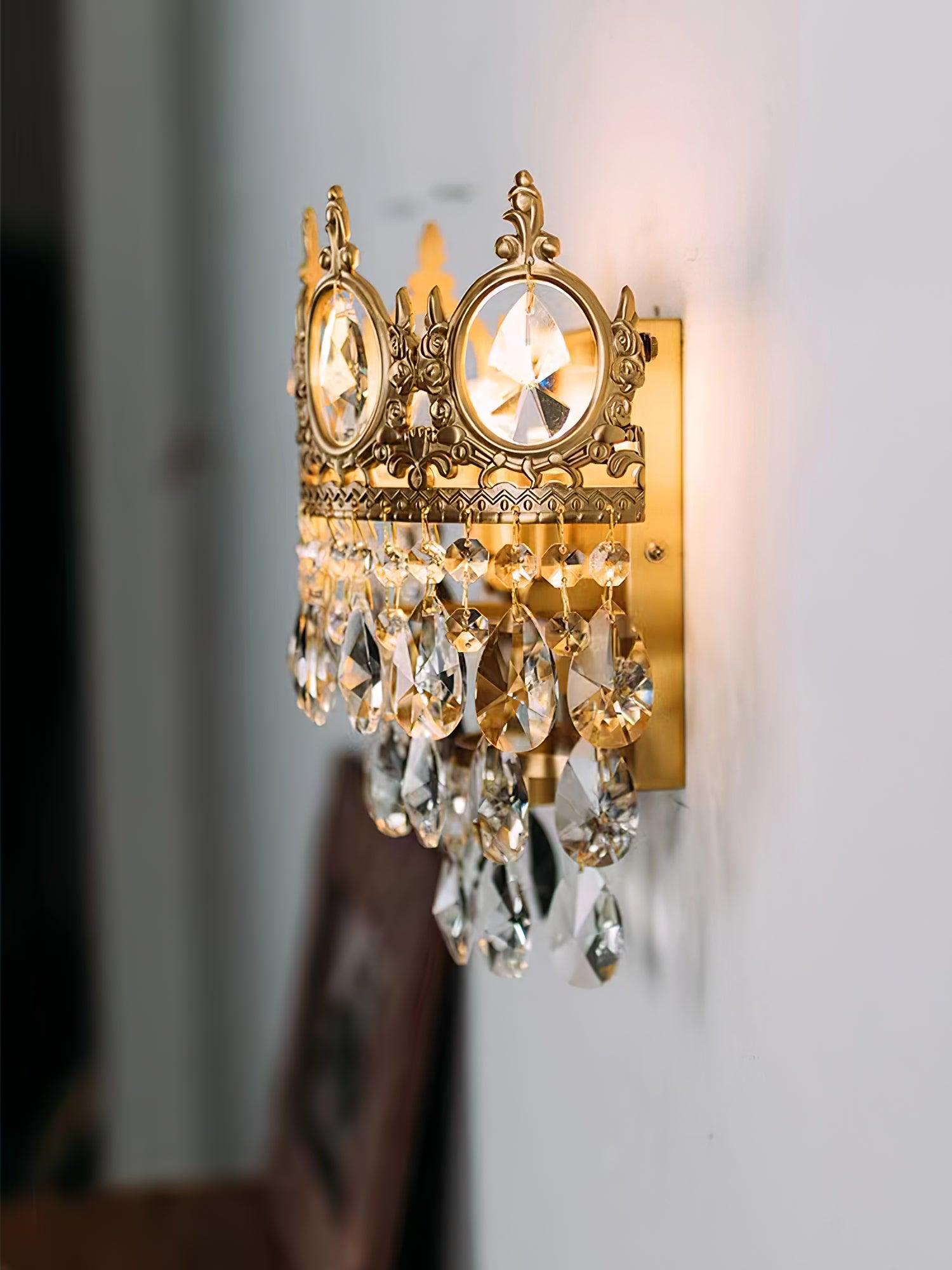 Side view of crystal sconce projecting from a wall