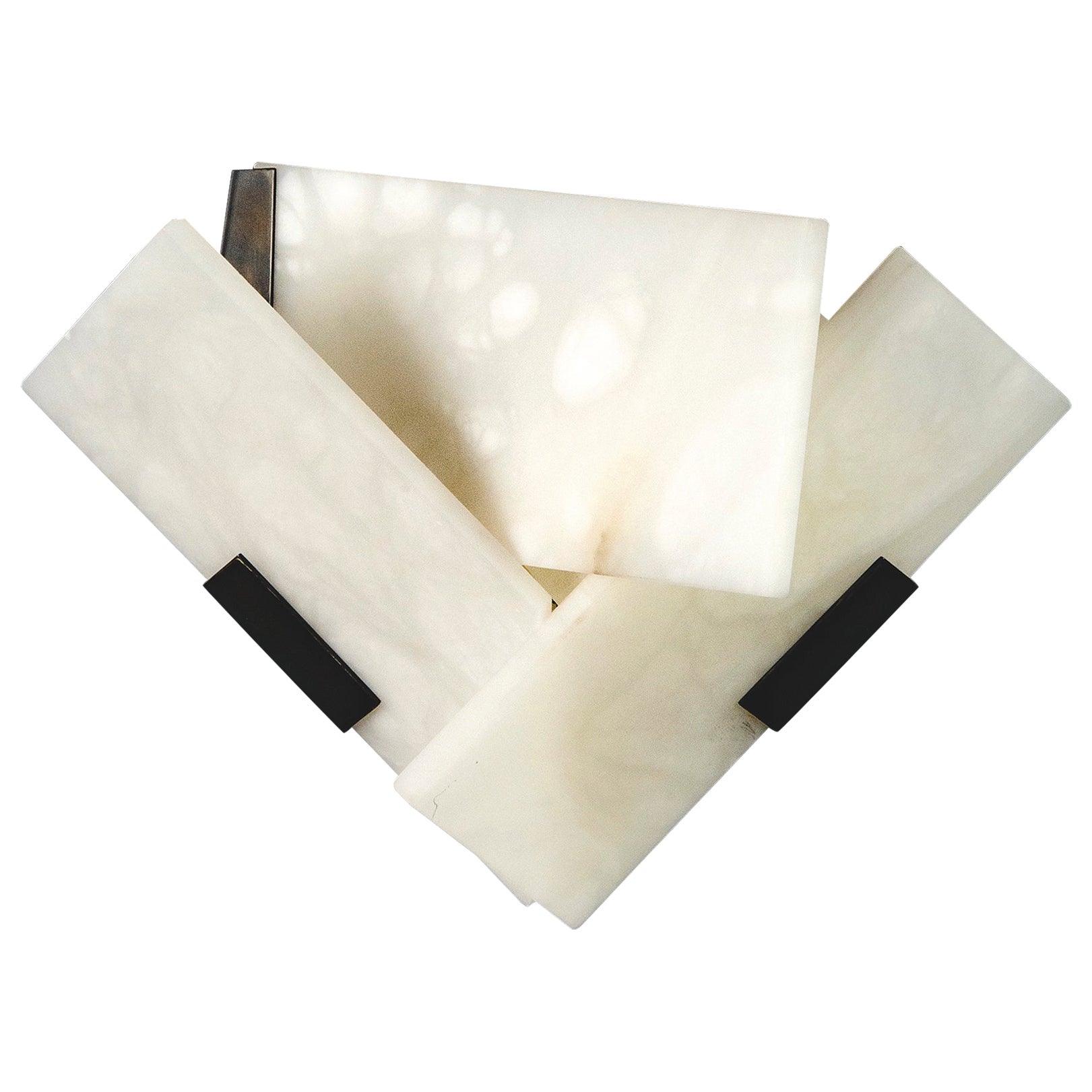 Close illuminated white stone panels with natural patterns and two black front clips on white