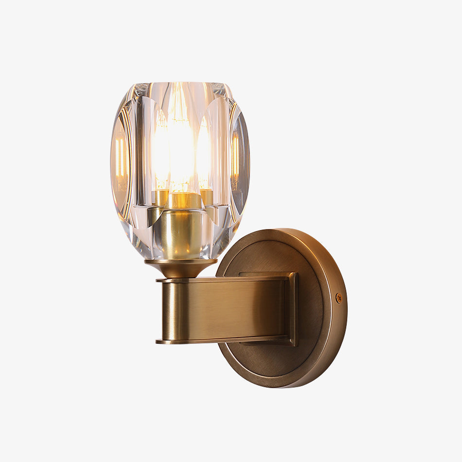 Faceted clear shade above a short brass-coloured arm