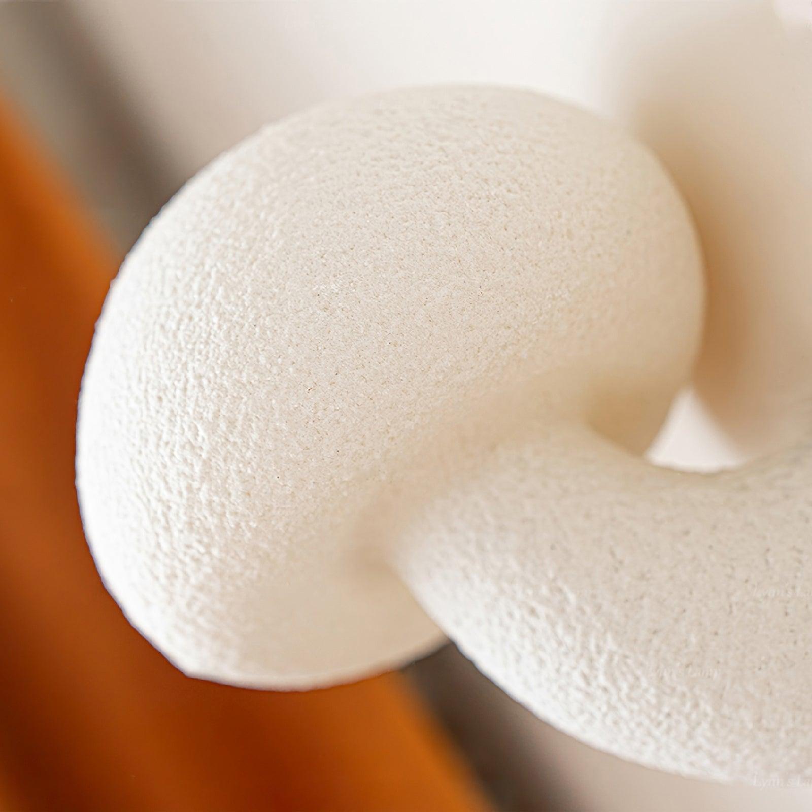 Close view beneath the rounded resin mushroom cap