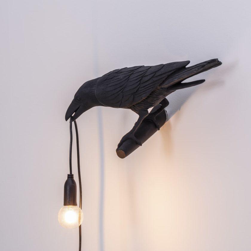 Angled Black bird lamp with hanging bulb