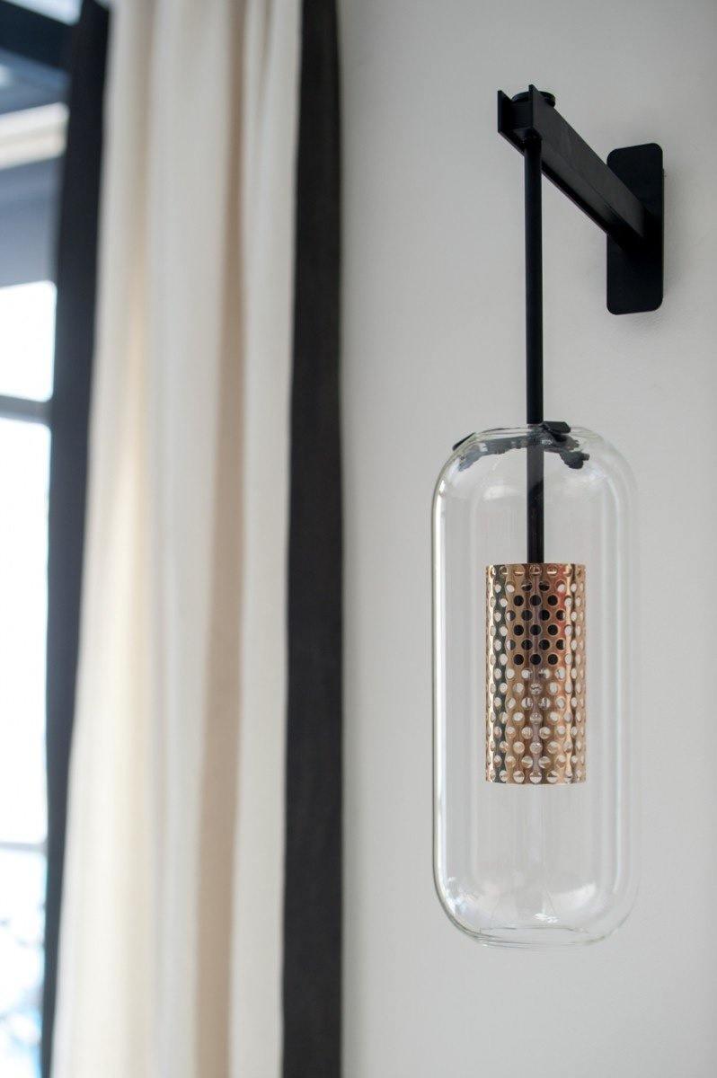Angled Black fixture with clear glass capsule