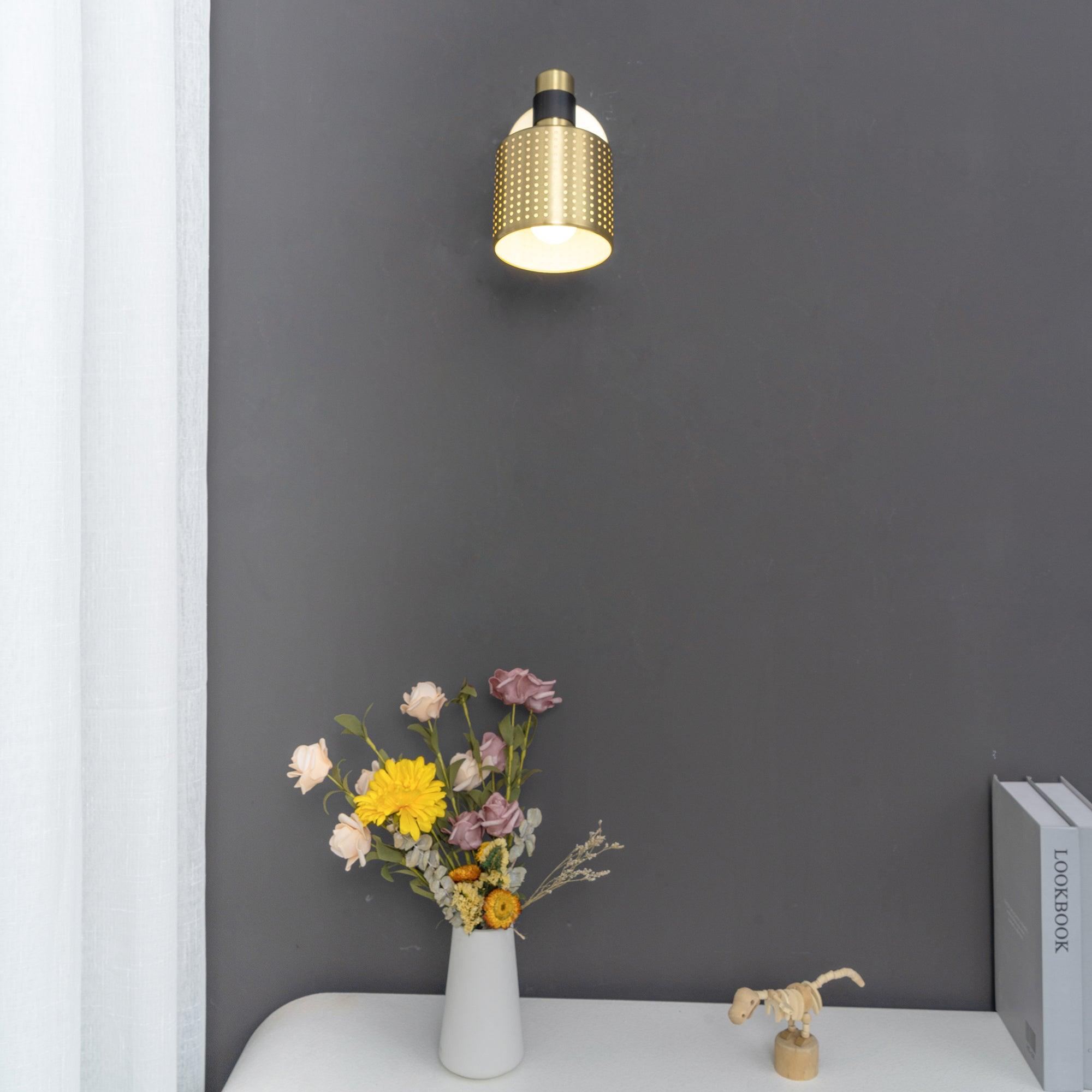 Riddle adjustable perforated metal wall light