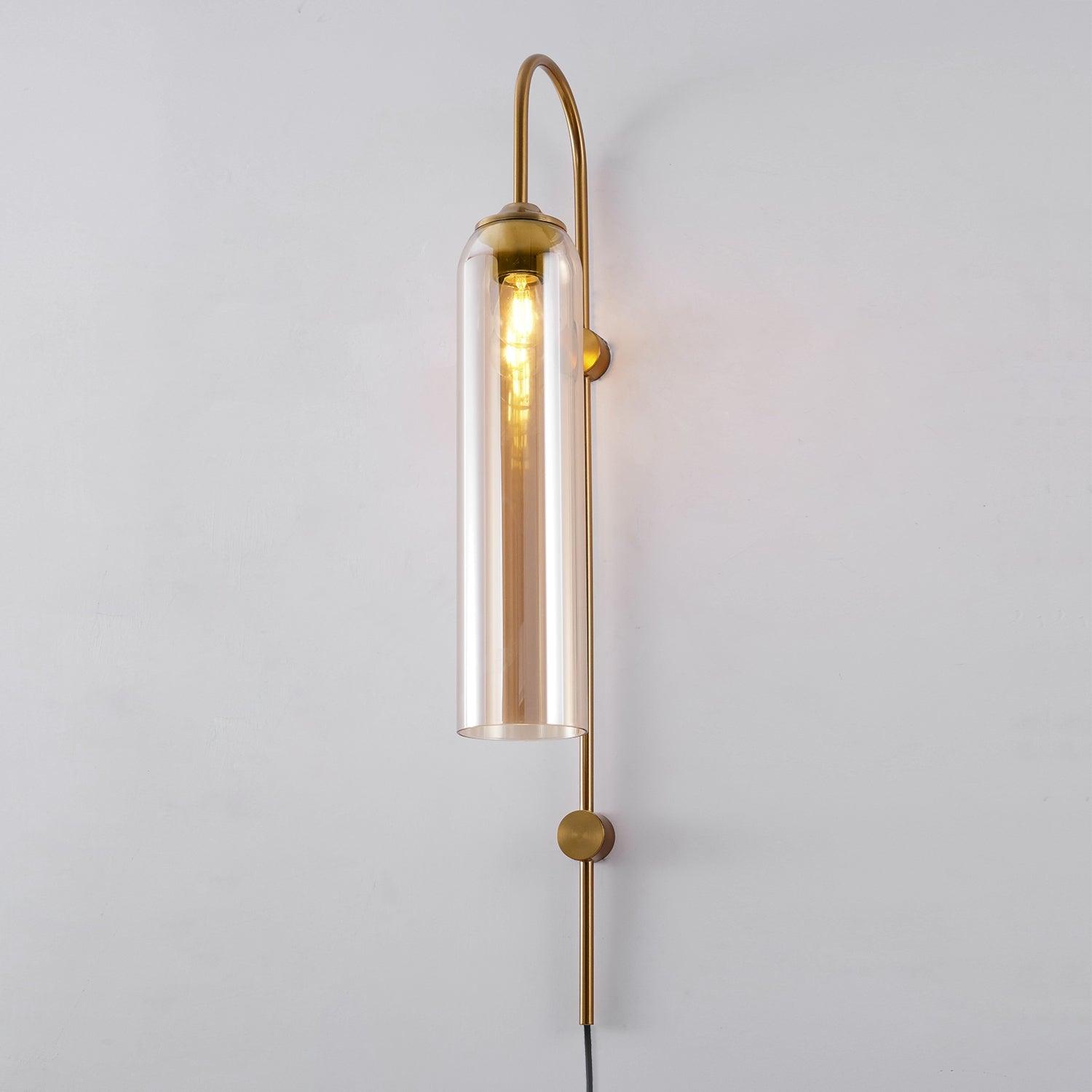 Amber glass tube with a visible light source and gold-coloured curved wall stem