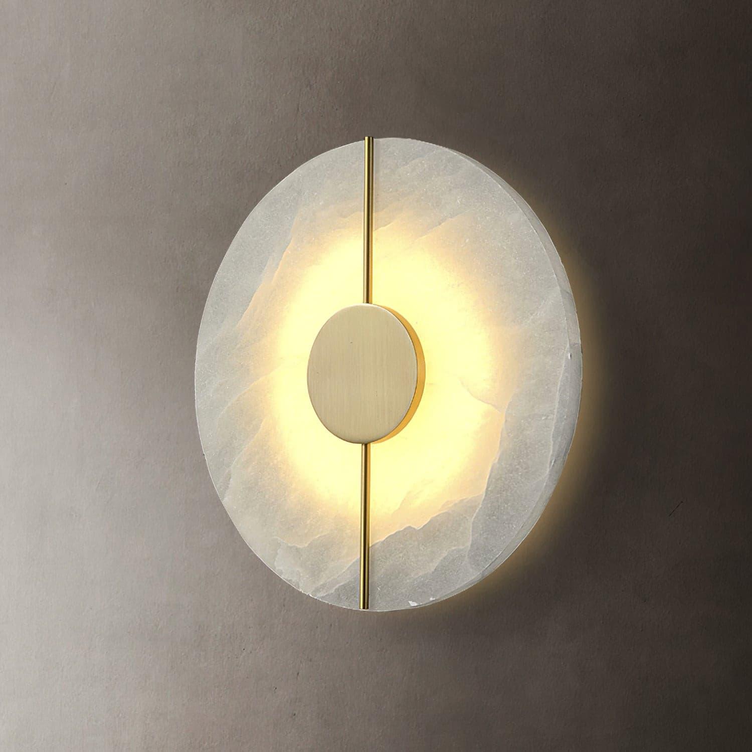 Round wall light with a vertical decorative line