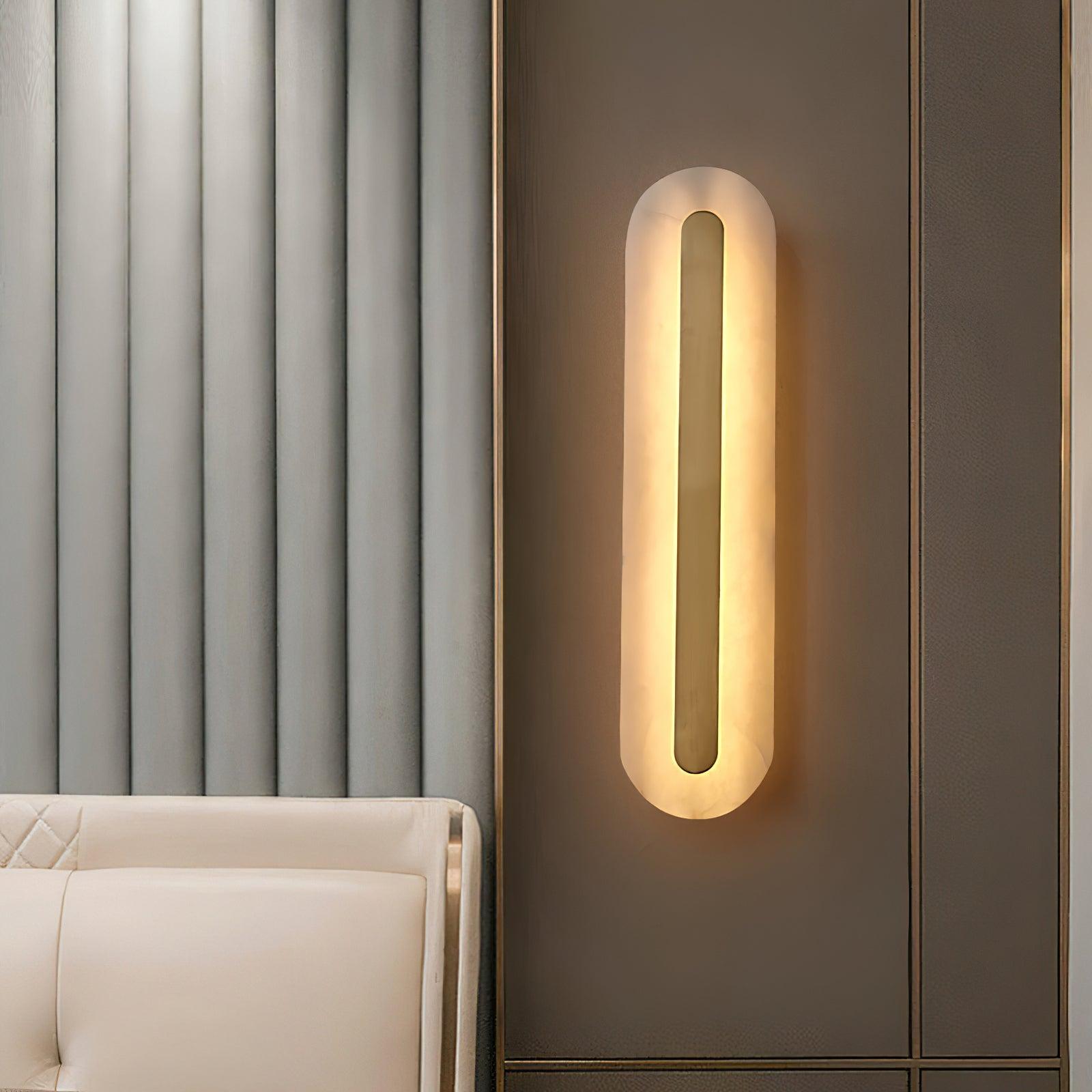 Warm light around a long stone panel