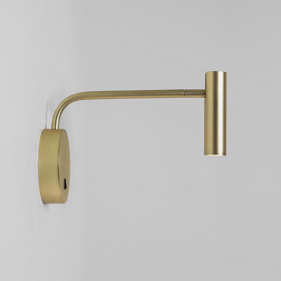 Side view of Gold finish wall fixture