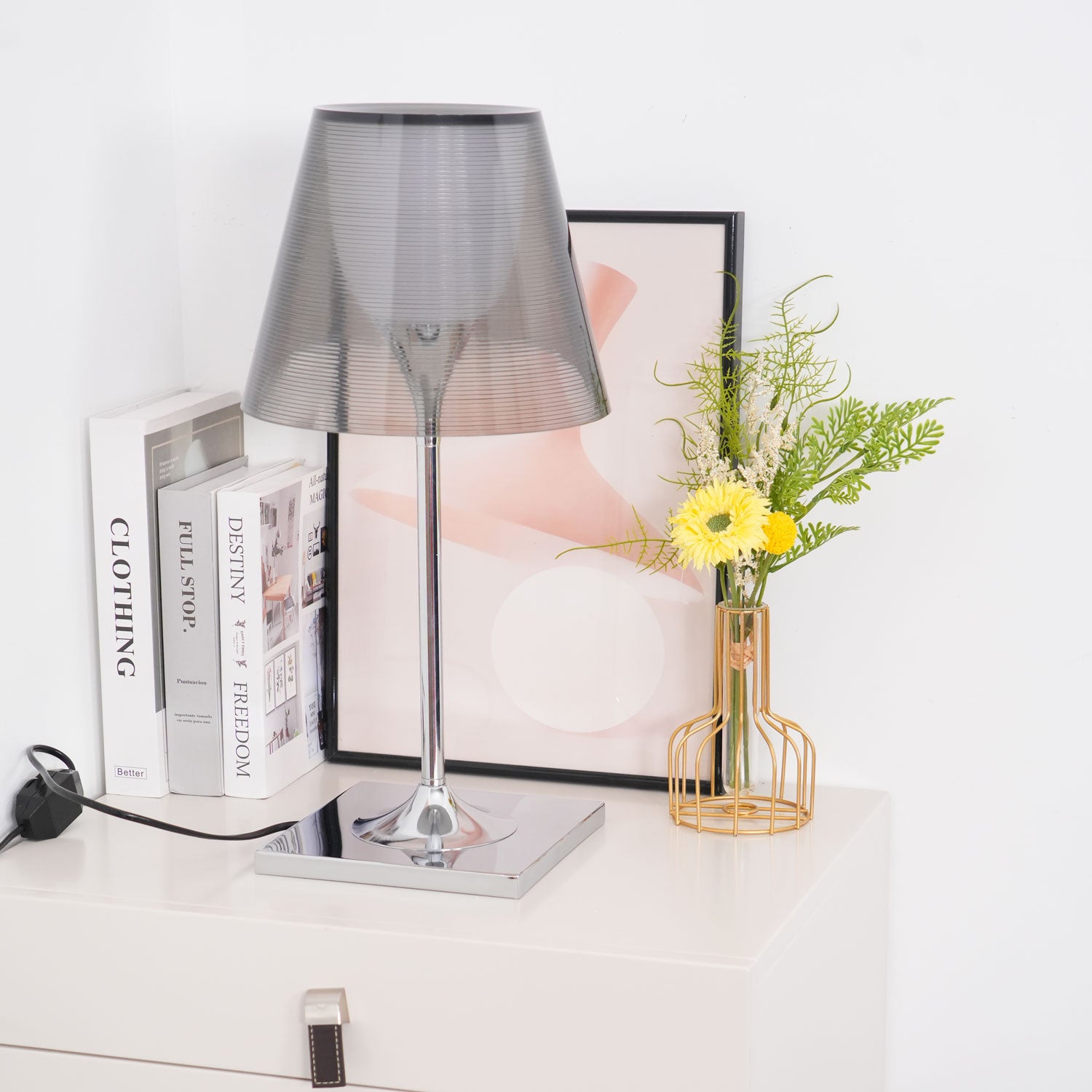 Chrome Prism table lamp showing cable on a pale surface