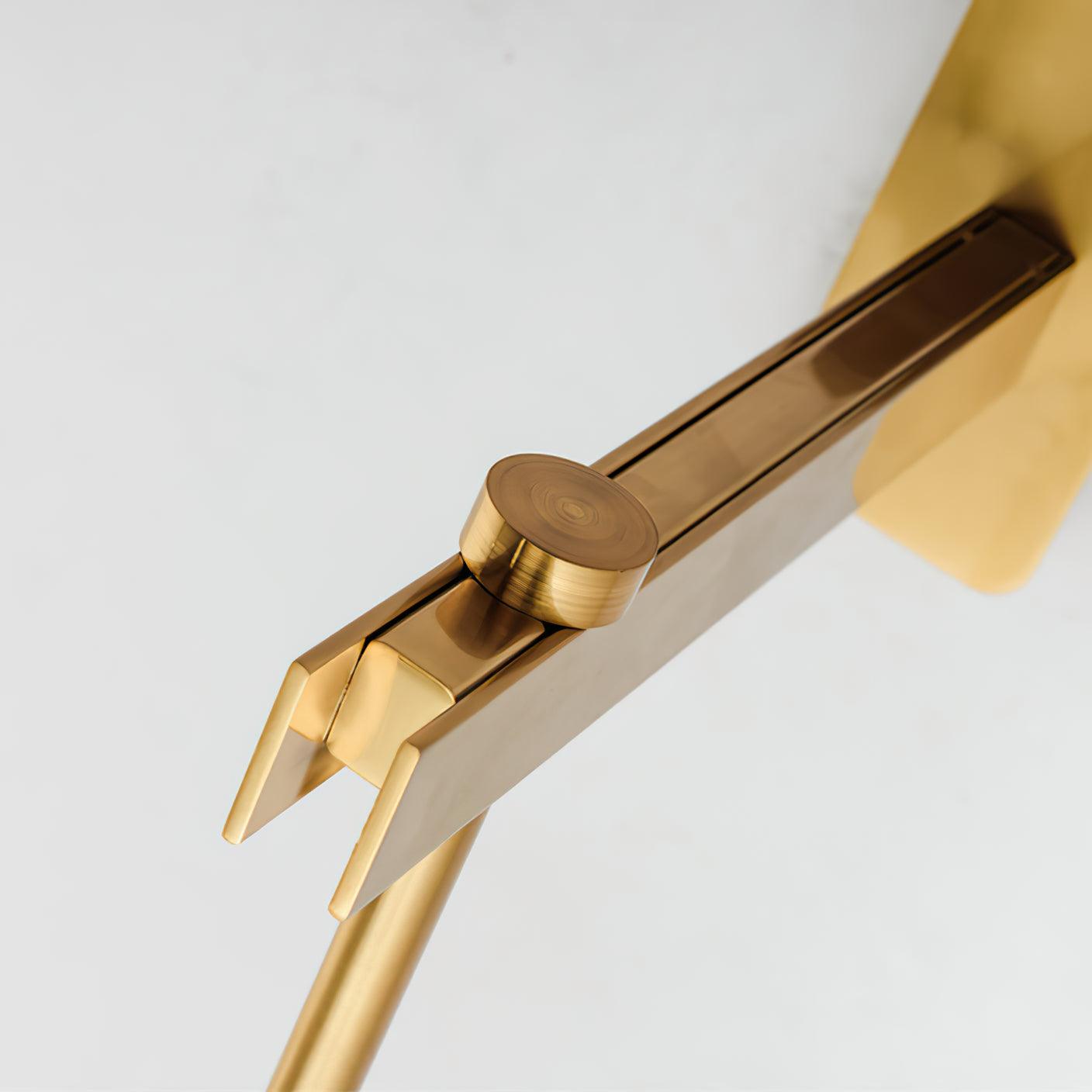 Underside close-up of Gold Vadim wall arm, round rod attachment and rectangular mounting plate