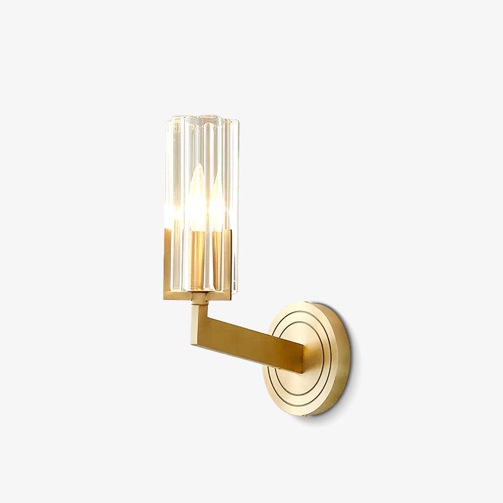 Small isolated single-shade Kayla with lit clear glass at left, brass right-angle arm and ringed wall plate at right