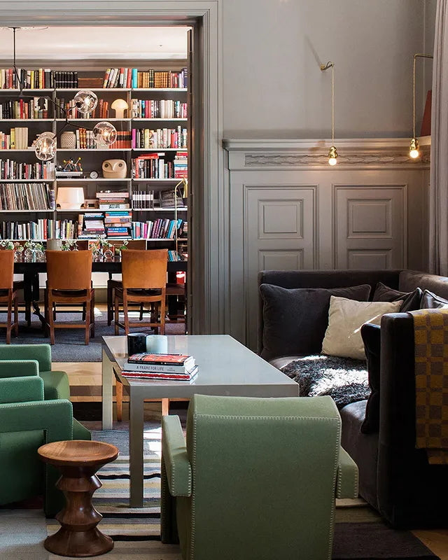 Suspended lights in a furnished dining interior
