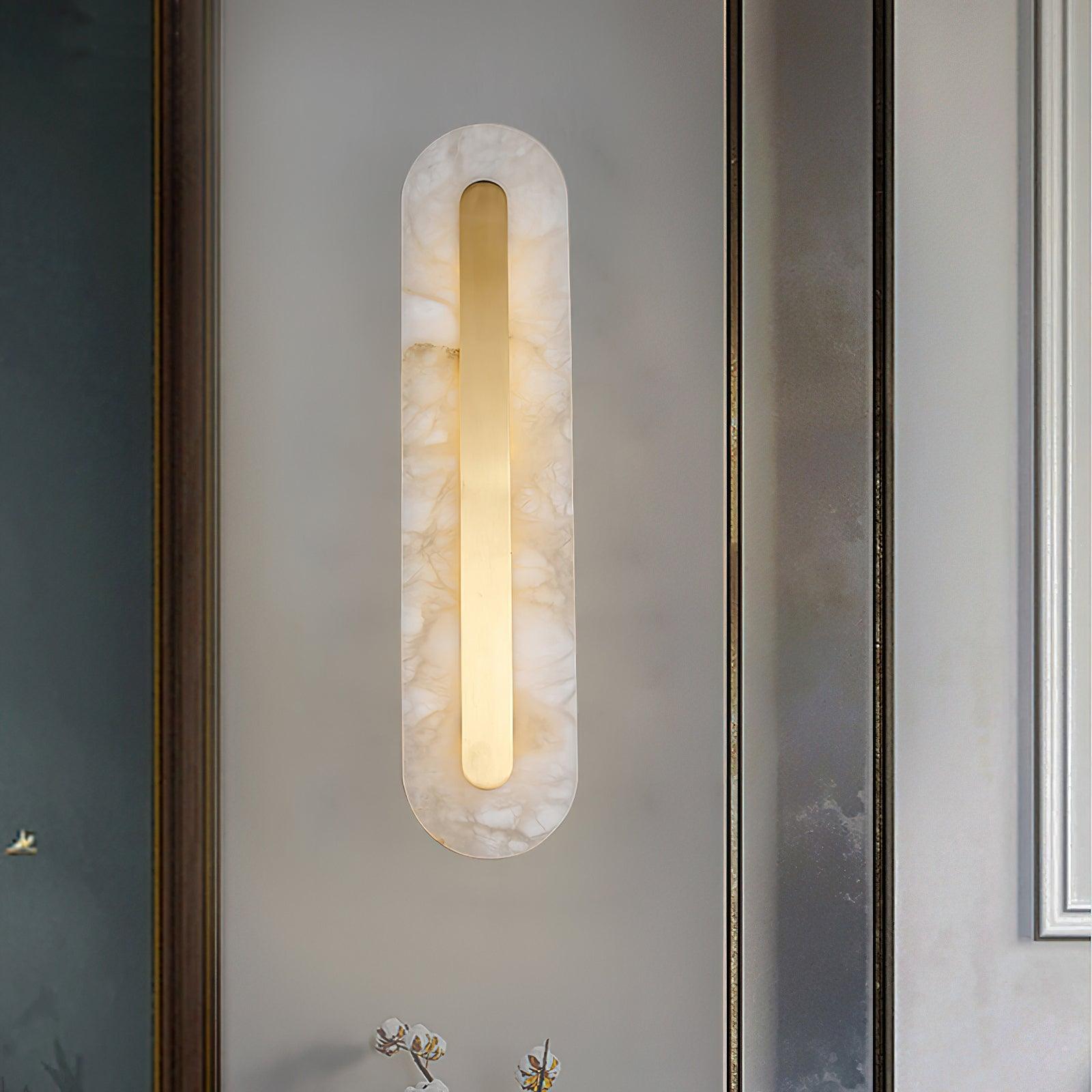 Tall alabaster fixture near an interior doorway