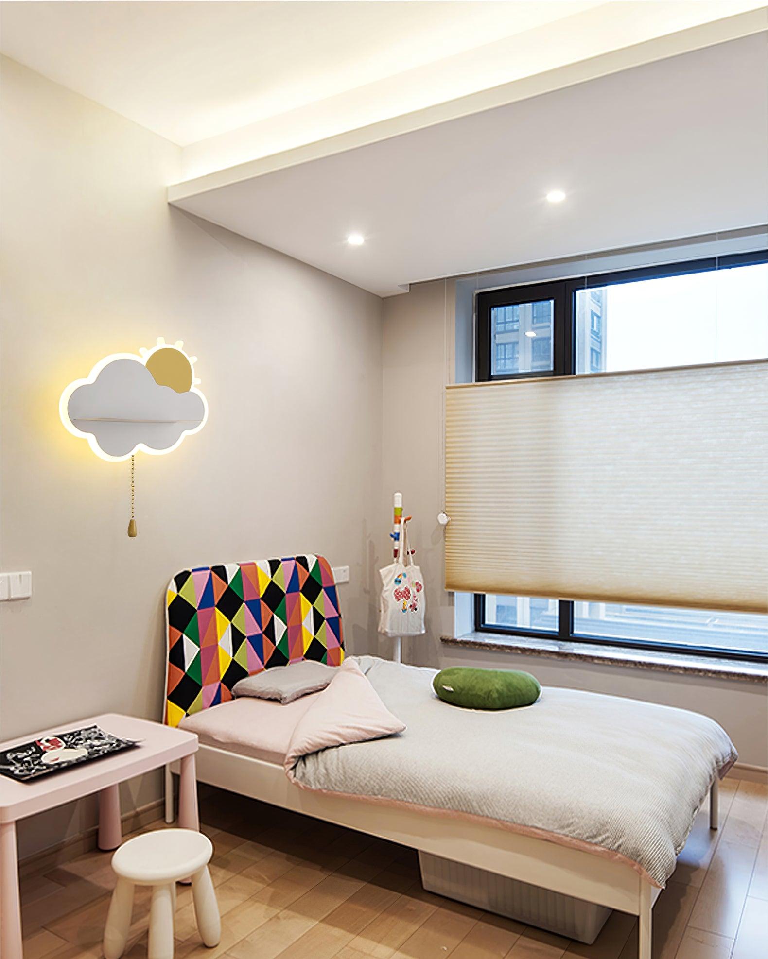Cloud wall light above a bedside area