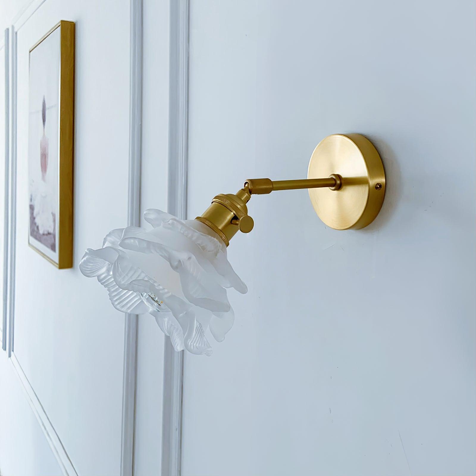 Side view of the unlit clear shade and brass arm