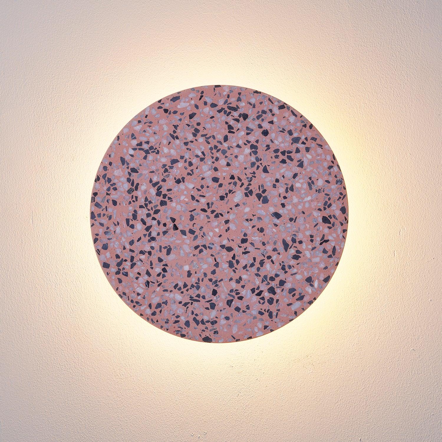 Pink disc with illuminated rear halo
