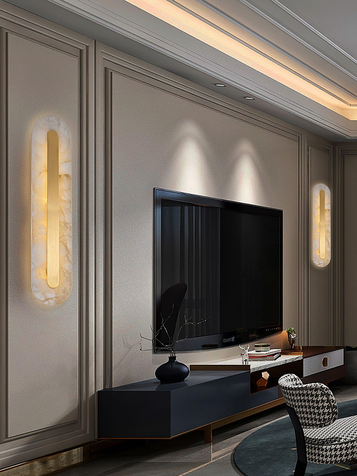 Pair of elongated wall lights beside a television